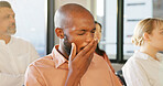 Business man, tired and yawning during a meeting, presentation of conference with employees listening and learning together. Men and women in audience at workshop or training feeling fatigue