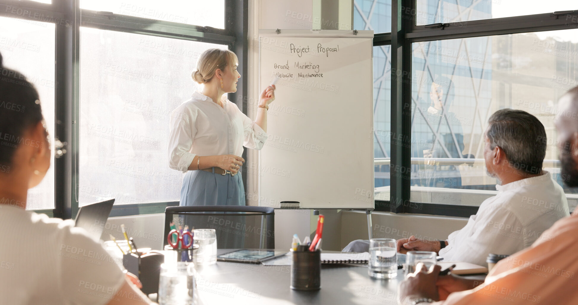 Buy stock photo Business people, whiteboard presentation and woman speaking of marketing proposal, brand ideas and training. Group of employees listening to manager for team workshop, meeting agenda or project goals