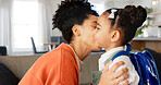 Little girl kissing her mother. Young mother hugging her daughter. Loving mother hugging daughter before school outside. Little girl going to school. Happy woman embracing daughter