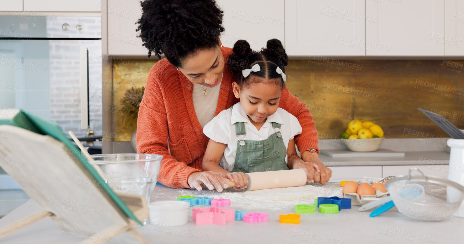 Buy stock photo Baking, kitchen and mother with kid help, learning and bonding for recipe, food or dessert. Happy family, rolling pin and African mom teaching girl to bake with flour, ingredients and cake in home