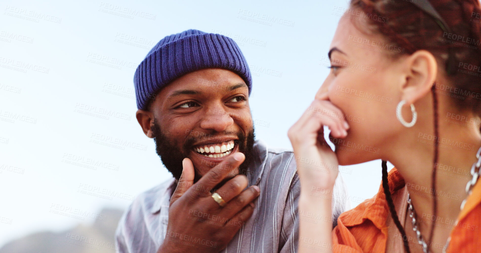 Buy stock photo Smile, conversation and young couple in the city on rooftop of building with freedom, energy and love. Happy, laughing and interracial man and woman talking, walking and bonding on balcony in town.