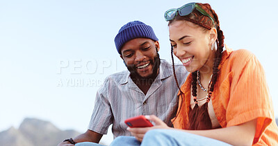 Couple, diversity love and phone in nature, outdoors or outside on holiday, vacation or trip. Happy, smile and man, woman and 5g mobile app, social media or web surfing online on tech while talking.