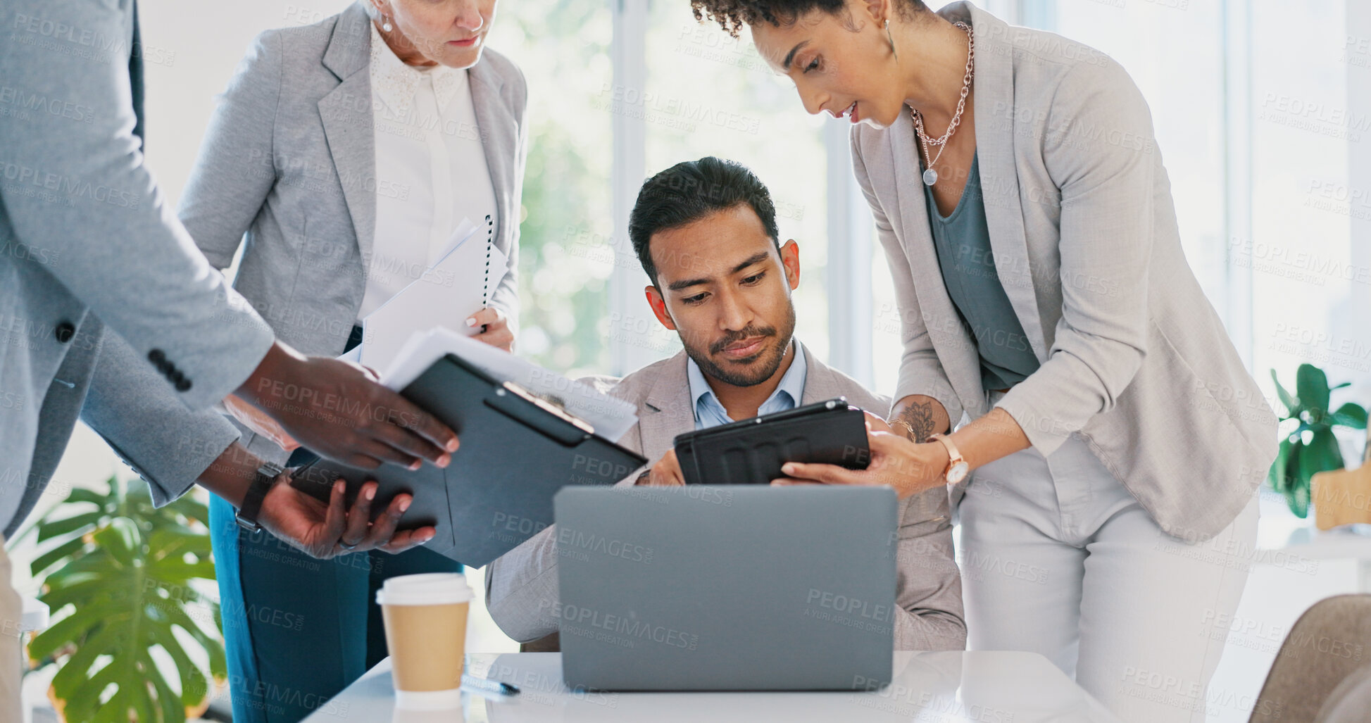 Buy stock photo Tablet, multitasking and business man with laptop in work project, teamwork and documents at desk. Office, computer and busy worker and people with paperwork, digital tech and productivity report