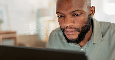Laptop, work and businessman reading an email, working on the internet and doing a search for ideas at work. African worker, employee or man in corporate on the web with technology for a project
