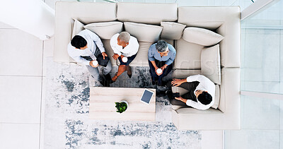 Corporate, lounge and business people on couch, relax and talk during lunch break with company chill spot top view. Diversity, social and employee group together with tablet and coffee break