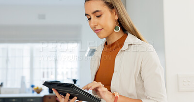 Couple, digital tablet and cooking with online recipe on the kitchen. Young man cutting vegetables and woman reading instructions on the internet, web or food website. while preparing healthy meal