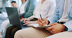 Recruitment, row and business people writing in notebook for hiring, job interview or work opportunity. Human resources, onboarding and candidates sitting with book, typing on laptop and write notes