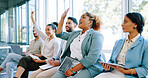 Interview, question and training with a business black woman raising her hand to answer during a meeting. Recruitment, human resources and hiring with a candidate group sitting in a row at an office