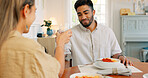 Toast, love and couple on a wine date in a house in celebration of a happy marriage and anniversary. Smile, romance and young woman drinking alcohol and eating spaghetti food with a romantic partner