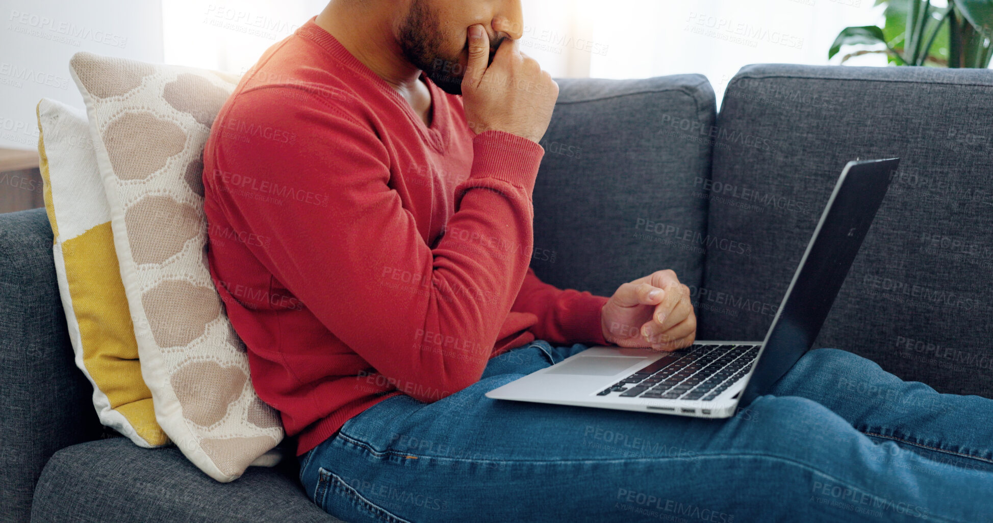 Buy stock photo Shock, stress and man on laptop on sofa in the living room for research on the internet. Surprise, upset and male person typing on computer for networking on social media in the lounge at home.