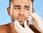 Beauty, face and skincare with man and needle with fear for prp, aesthetic or spa for cosmetology improvement. Luxury, plastic surgery and vanity injection and scared model with collagen or filler