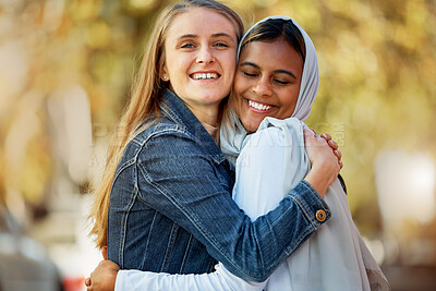 Buy stock photo Portrait, hug and love with a friends in the park together during summer on a blurred background. Happy, smile or diversity with a young female and friend hugging outside in a sunny garden