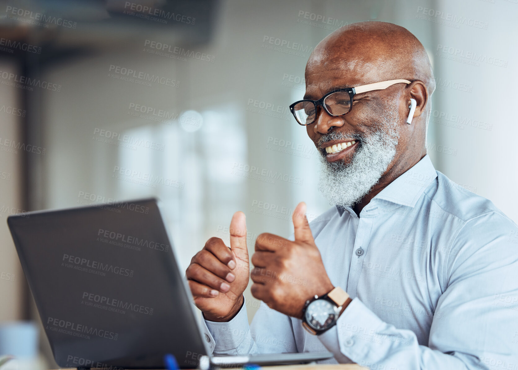 Buy stock photo Thumbs up, laptop and African businessman on online meeting or virtual discussion in his office. Happy, success and senior male manager with approve gesture on video call with computer in workplace.