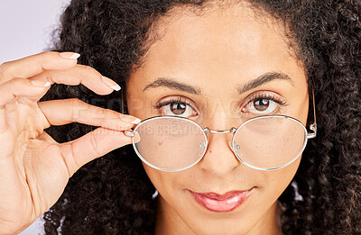 Buy stock photo Vision, portrait and black woman in studio, confident and holding spectacles frame. Face, attitude and prescription eyewear for lady showing eye care, glasses and optician, eyesight or trendy eyewear
