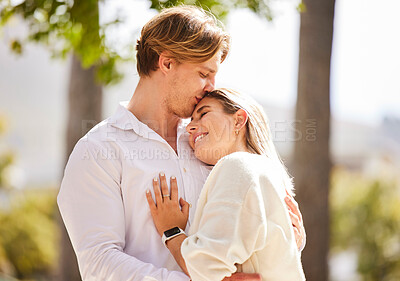 Buy stock photo Park, love and couple hug for happy, quality time and bonding on weekend, vacation and holiday together. Dating, relationship and young man and woman hugging, kissing and romantic embrace in nature