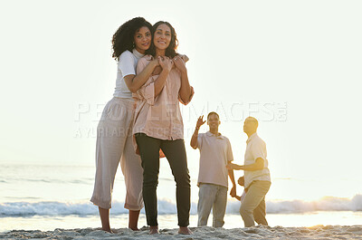 Buy stock photo Embrace, portrait and mother and daughter at the beach for vacation, family walk and bonding. Sunset, love and elderly mom and woman hugging with affection while walking at ocean in summer for peace