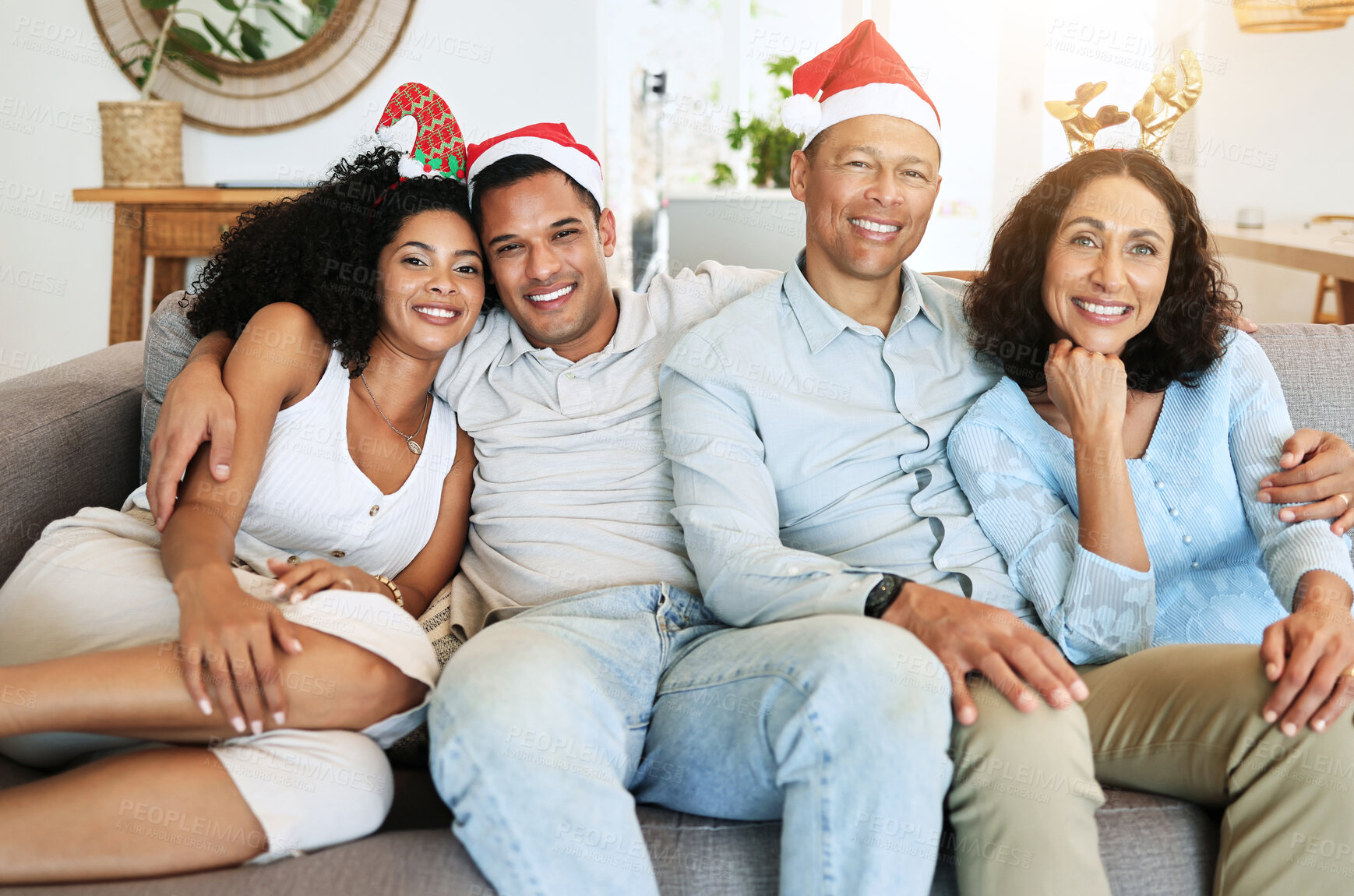 Buy stock photo Christmas, happy family and people on holiday in a home celebrating on vacation and bonding in a house. Portrait, men and women on a couch or sofa in December for celebration together in living room