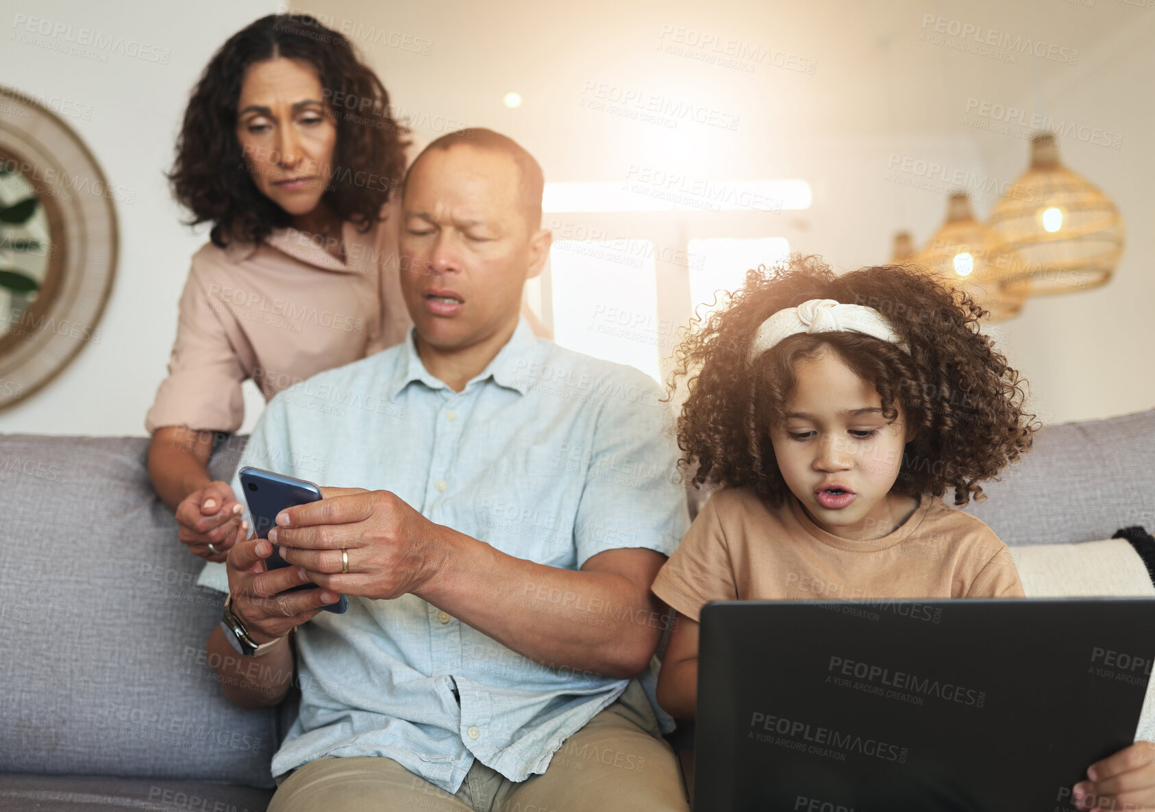 Buy stock photo Grandparents, girl and technology in living room, stress and communication with device, couch and relax. Love, granny and grandfather with female child, smartphone and connection in lounge or family 