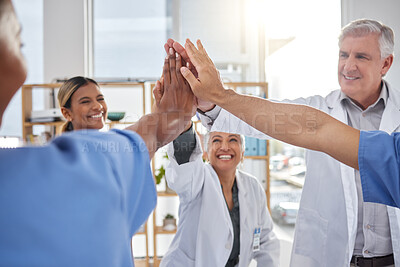 Buy stock photo Success, high five or nurses in meeting for a strategy, goals or working in hospital for healthcare. Hands together, team building or group of happy doctors with a target mission planning ideas 