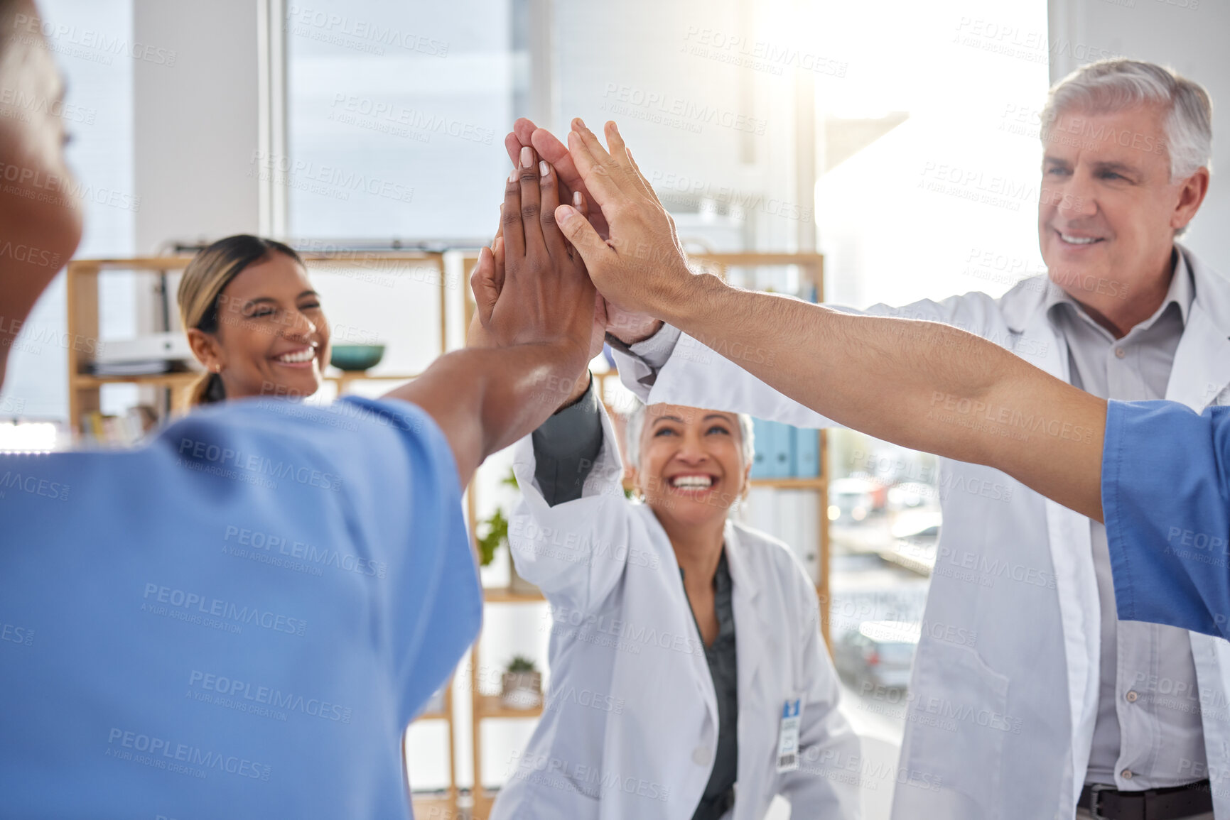 Buy stock photo Success, high five or nurses in meeting for a strategy, goals or working in hospital for healthcare. Hands together, team building or group of happy doctors with a target mission planning ideas 