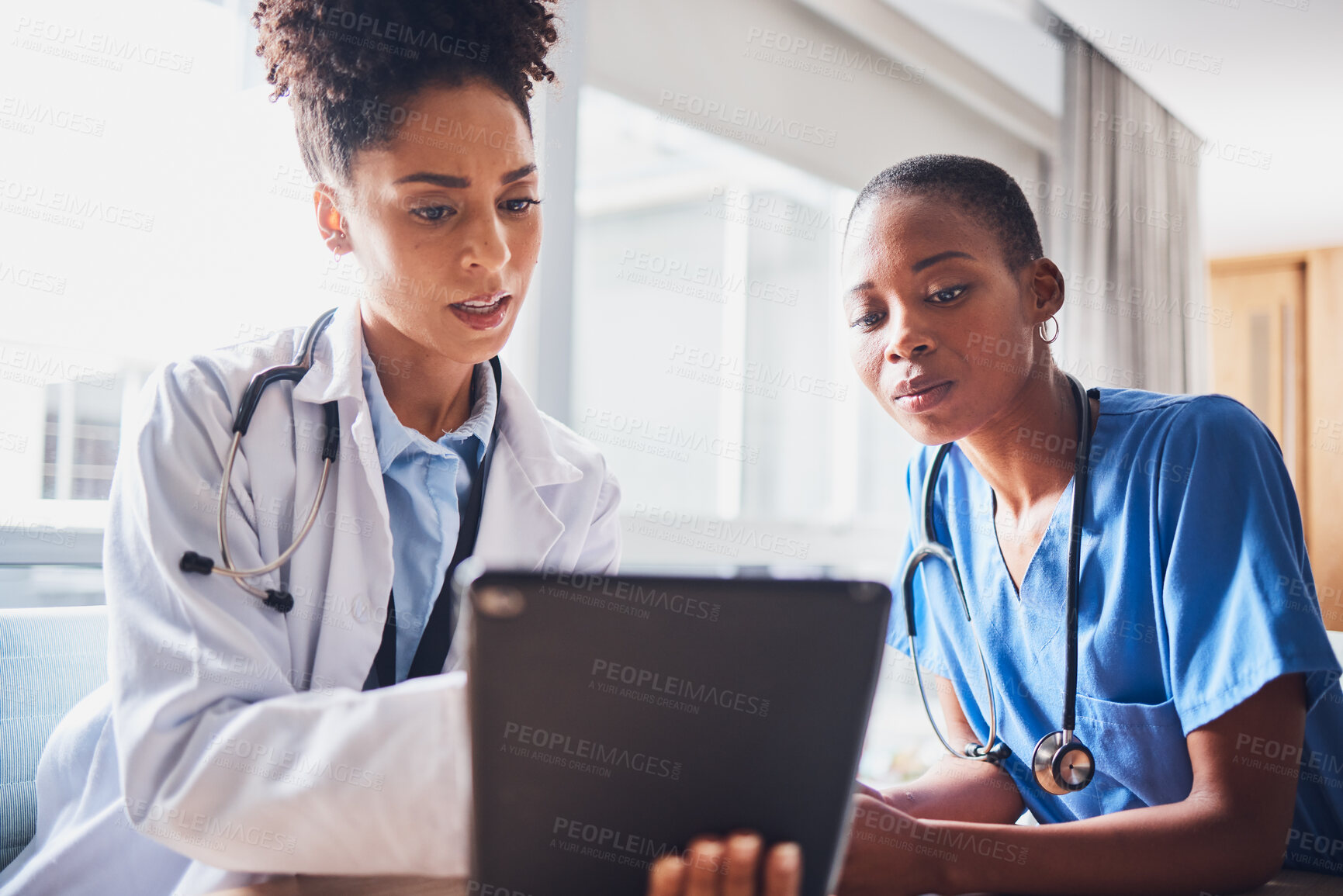 Buy stock photo Tablet, black people or nurses reading news, medical research or tests results in hospital together. Teamwork, digital media or African doctors planning or speaking of healthcare report on website