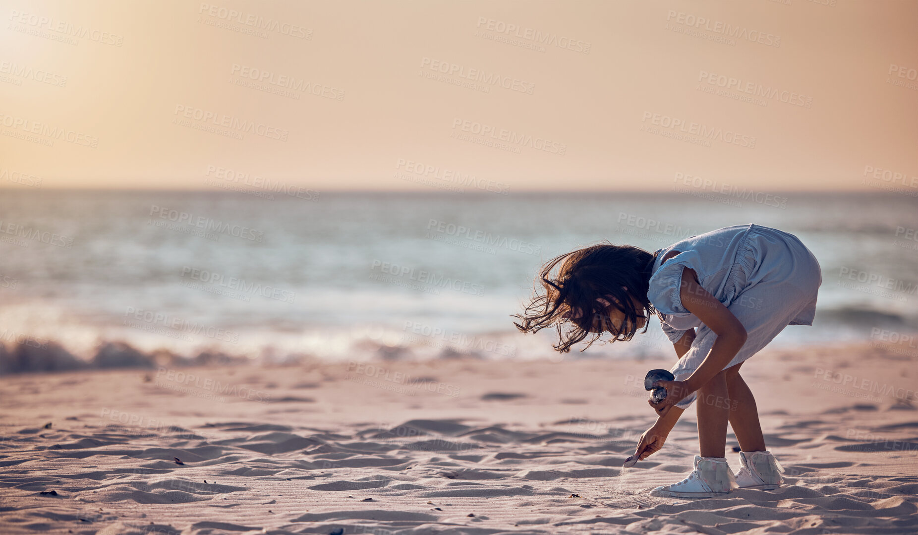 Buy stock photo Mockup, girl and beach for summer vacation, sand and search for seashells, happiness and water. Female child, kid and young person on seaside holiday, collection or freedom with peace, relax or break