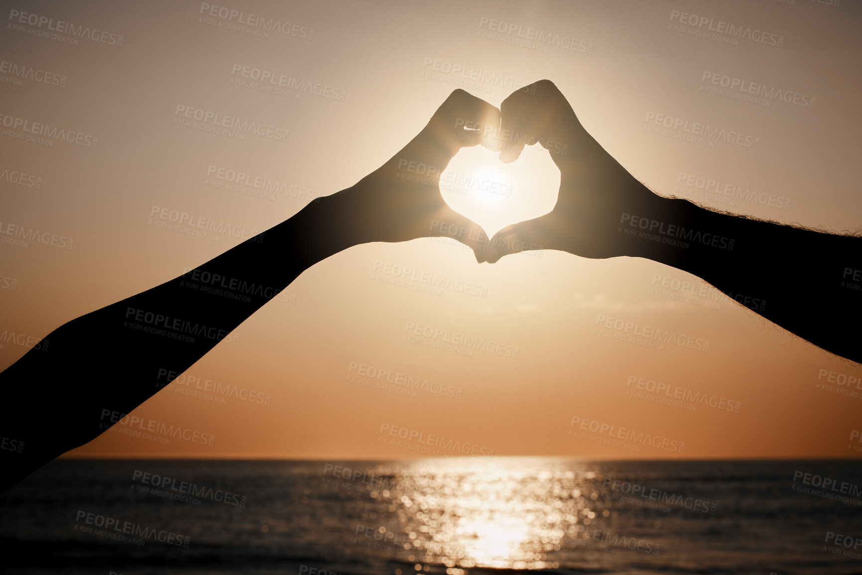 Buy stock photo Beach sunset silhouette, couple and heart hand sign for travel freedom, outdoor peace or nature beauty. Wellness, sky flare and emoji gesture for ocean love, sun light or sea water on summer holiday