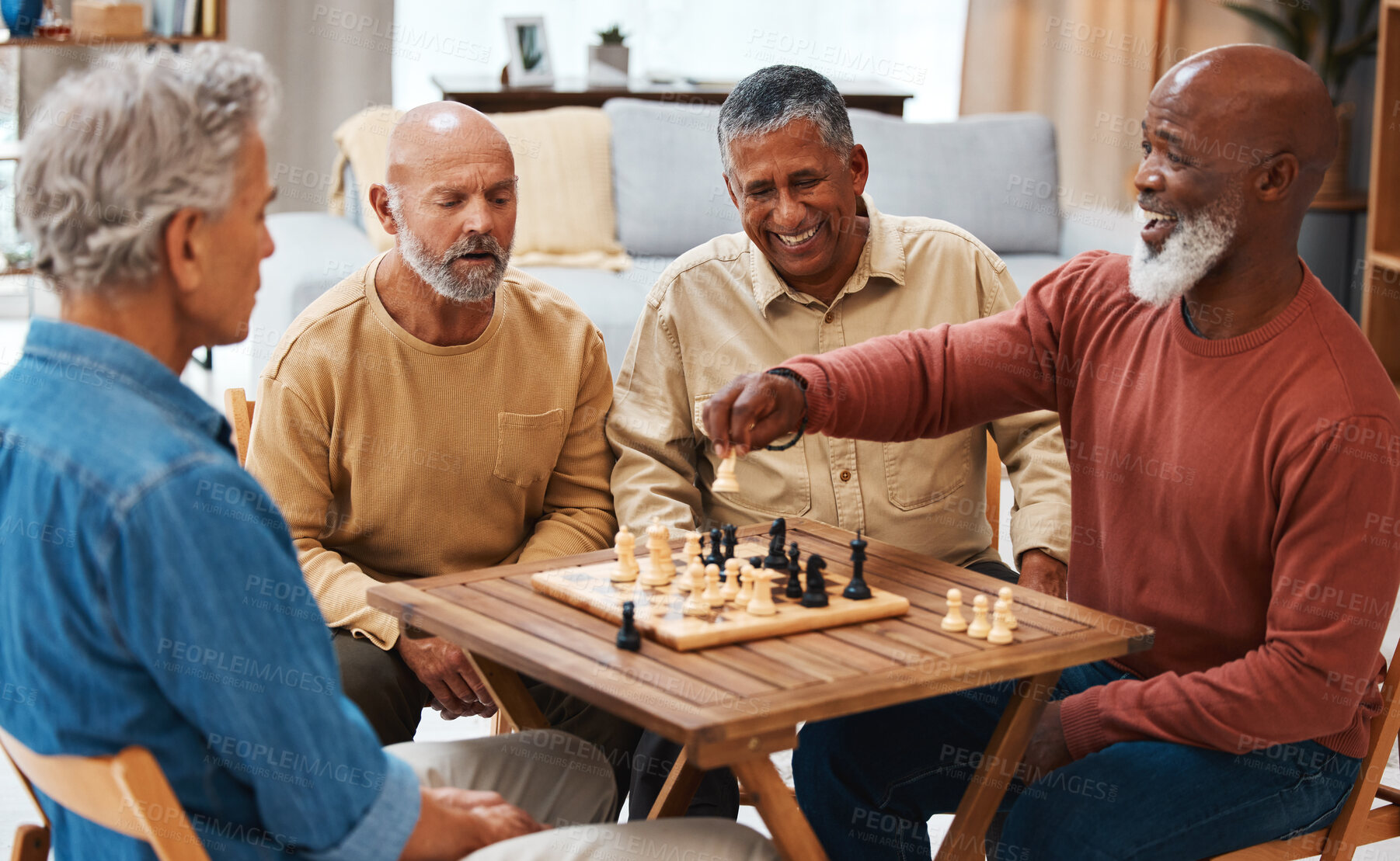 Buy stock photo Chess, friends and board games on wooden table for strategic, cocky or tactical move at home. Senior group of men playing and holding white knight piece after attack showing skill and tactics