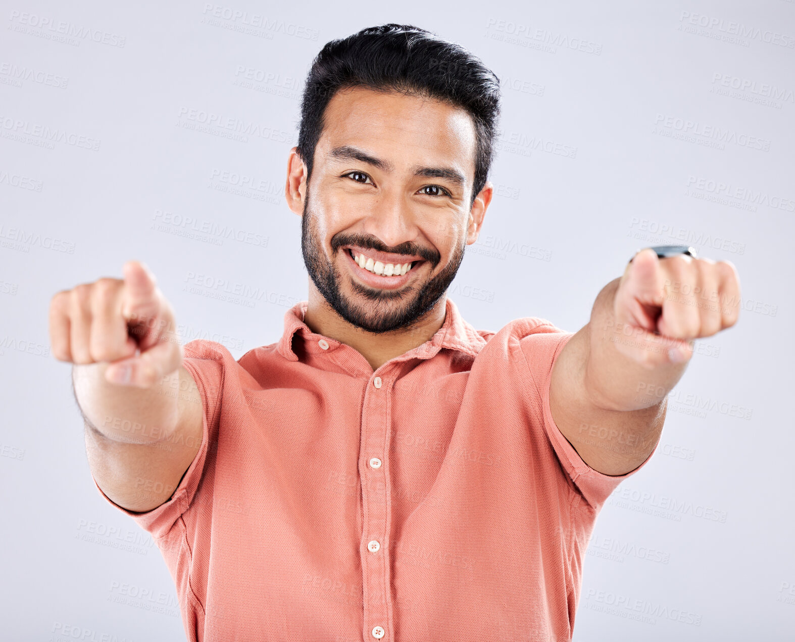 Buy stock photo Portrait, pointing and motivation with a man in studio on a gray background choosing an option or selection. Happy, smile and hey you with a handsome young male making a choice or decision