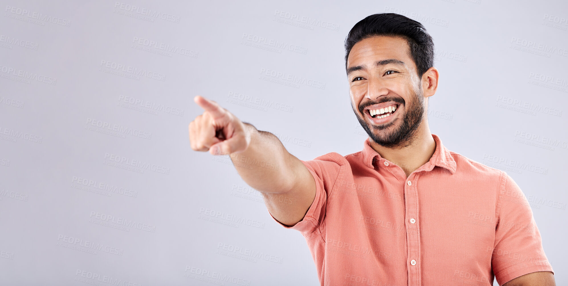 Buy stock photo Happy, laughing and Asian man pointing for bullying isolated on a grey studio background. Funny, joke and Japanese with a hand gesture for making fun, prank and amusement on a backdrop with mockup