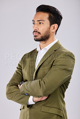 Buy stock photo Business, serious and Asian man arms crossed, leadership and concentration with guy against a grey studio background. Male entrepreneur, employee and manager with thoughts, thinking and future ideas