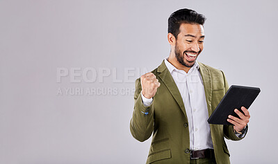 Buy stock photo Businessman, tablet or success fist on isolated studio background for financial growth, stock market deal or mock up security. Smile, happy or cheering asian man with winner hands, technology or loan