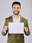 Portrait, mockup and man with logo, business and happiness with guy on grey studio background. Face, male employee and entrepreneur with card, board and space for brand development, paper and startup