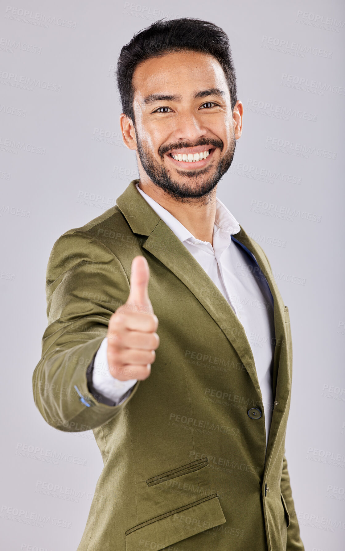 Buy stock photo Business portrait, smile and Asian man with thumbs up in studio isolated on a gray background. Ceo, boss and happy male entrepreneur with hand gesture or emoji for yes, success agreement or thank you