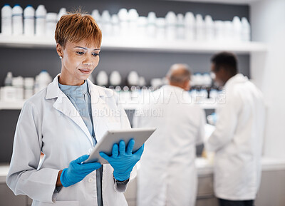 Buy stock photo Medical science, tablet and doctor woman in laboratory for research, results or data analysis. Mature scientist person with technology mobile app for internet, innovation and development for future