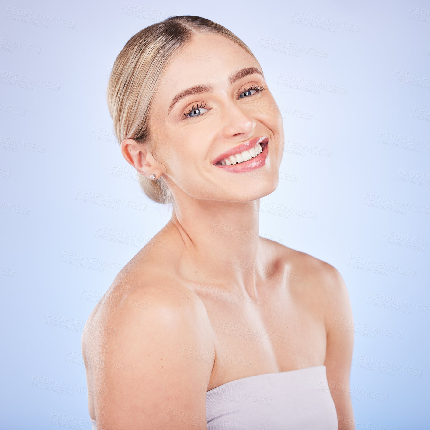 Buy stock photo Face portrait, skincare and smile of woman in studio isolated on a blue background. Makeup cosmetics, aesthetic and beauty of happy female model with spa facial treatment for glowing and healthy skin