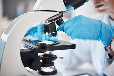 Buy stock photo Medical science, hands and microscope in a laboratory for research, analysis and study. Scientist person in lab for futuristic development, innovation and biotechnology with dna or bacteria particle