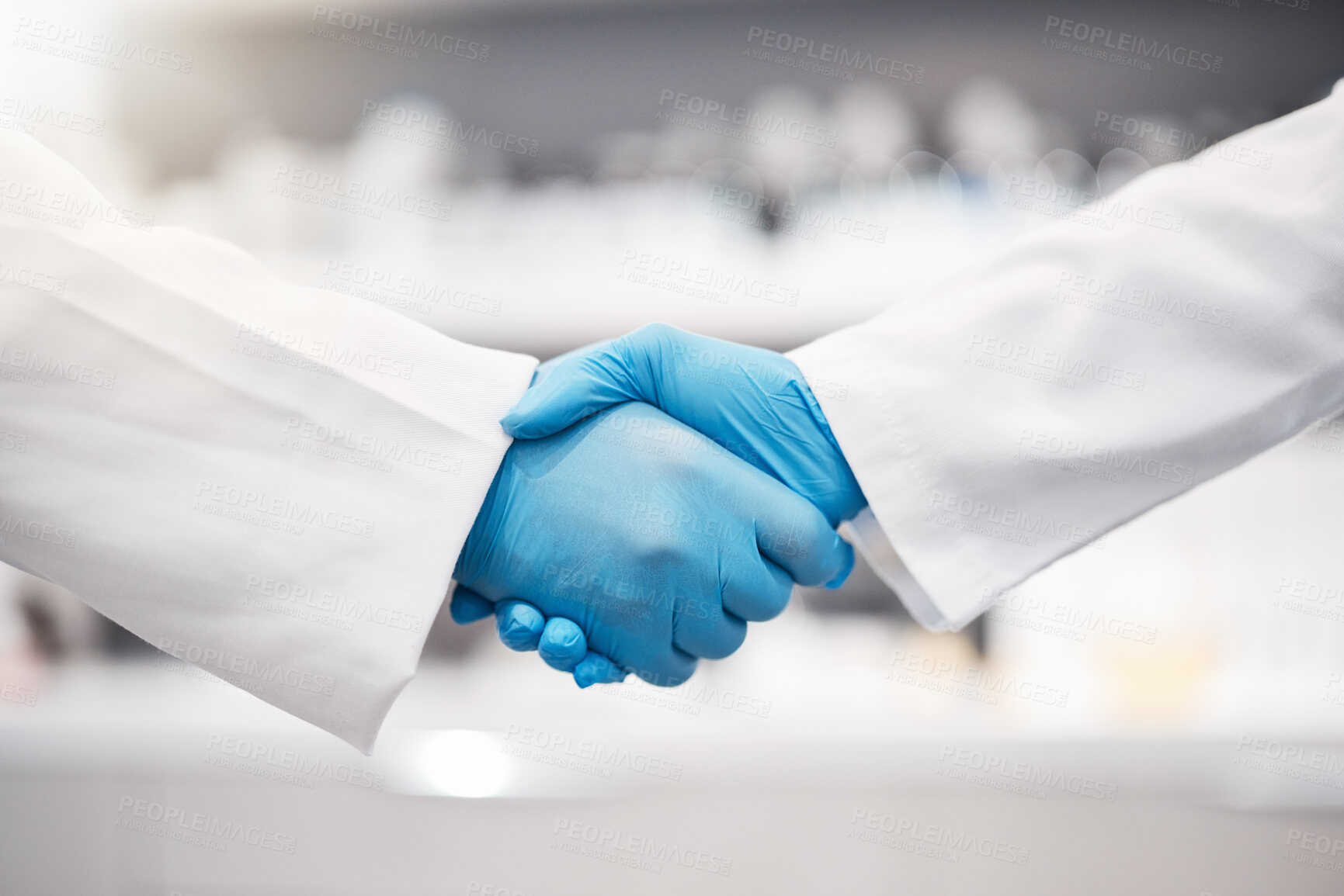 Buy stock photo Doctor, handshake and gloves for healthcare, partnership or trust for collaboration, unity or lab support at. Team of medical experts shaking hands in teamwork for agreement or research success