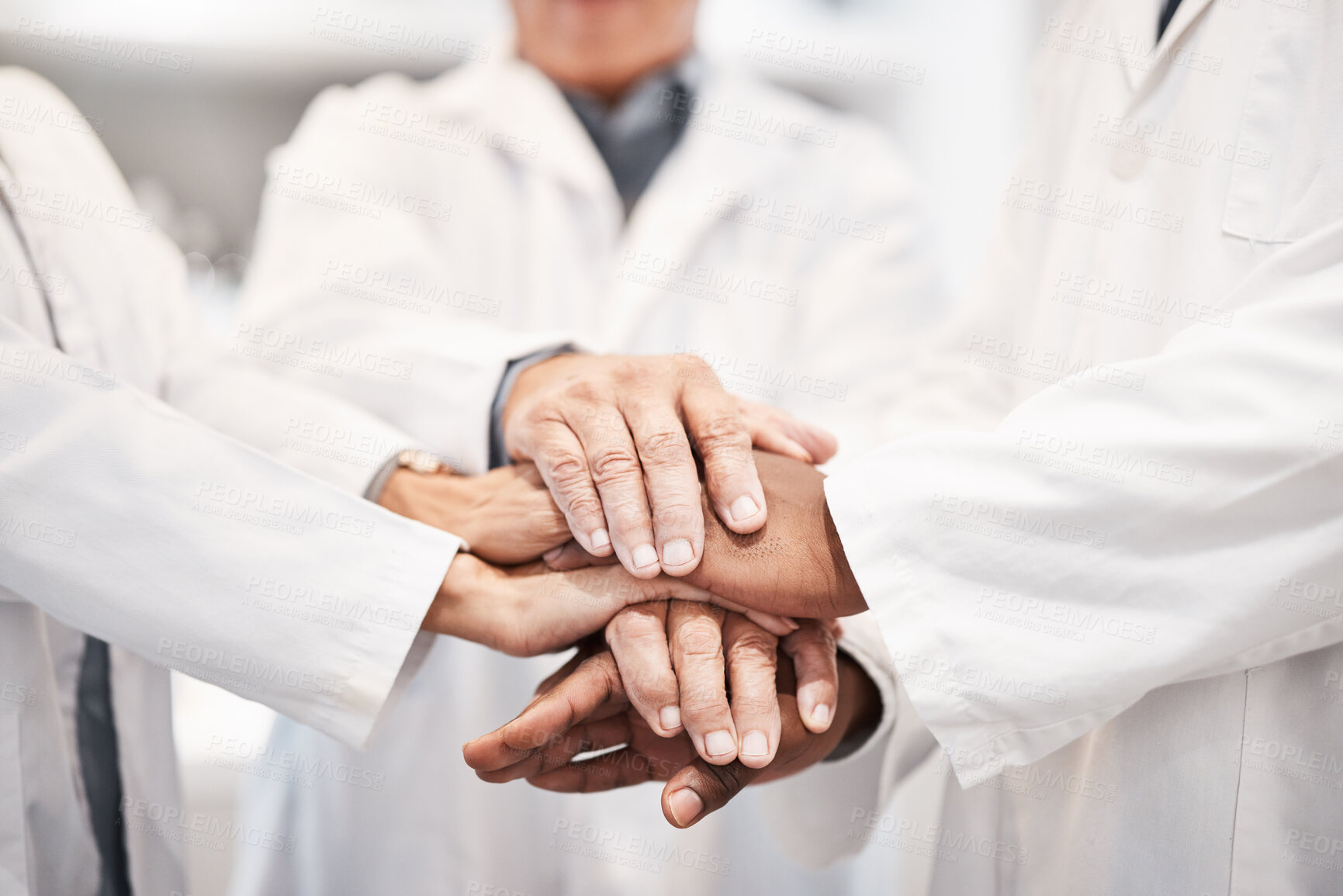 Buy stock photo Doctor, team and hands together in healthcare, partnership or trust for collaboration, unity or support at lab. Group of medical experts piling hand in teamwork for motivation, cooperation or union