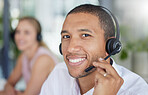 Smile, headset and portrait of a man in a call center for online support, consulting and advice. Happy, conversation and face of a customer service agent working in telemarketing, sales and helpline