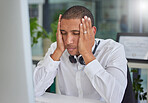 Stress, anxiety or black man in call center with burnout or migraine pain at customer services help desk. Tired, headache or sick sales consultant frustrated with mistakes in a telemarketing company