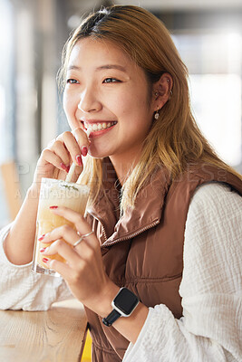 Buy stock photo Health, Asian woman and smoothie for diet, in a cafe and happiness for wellness and thinking. Japan, female and happy girl with milkshake, relax break and cheerful daydreaming by a restaurant window