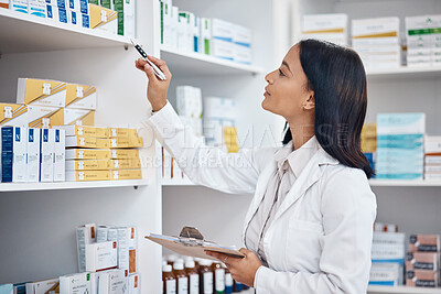Buy stock photo Pharmacy inventory check, Indian woman and checklist of medicine and pills. Pharmacist, stock work and pharmaceutical products in a retail shop or clinic with healthcare and wellness employee 