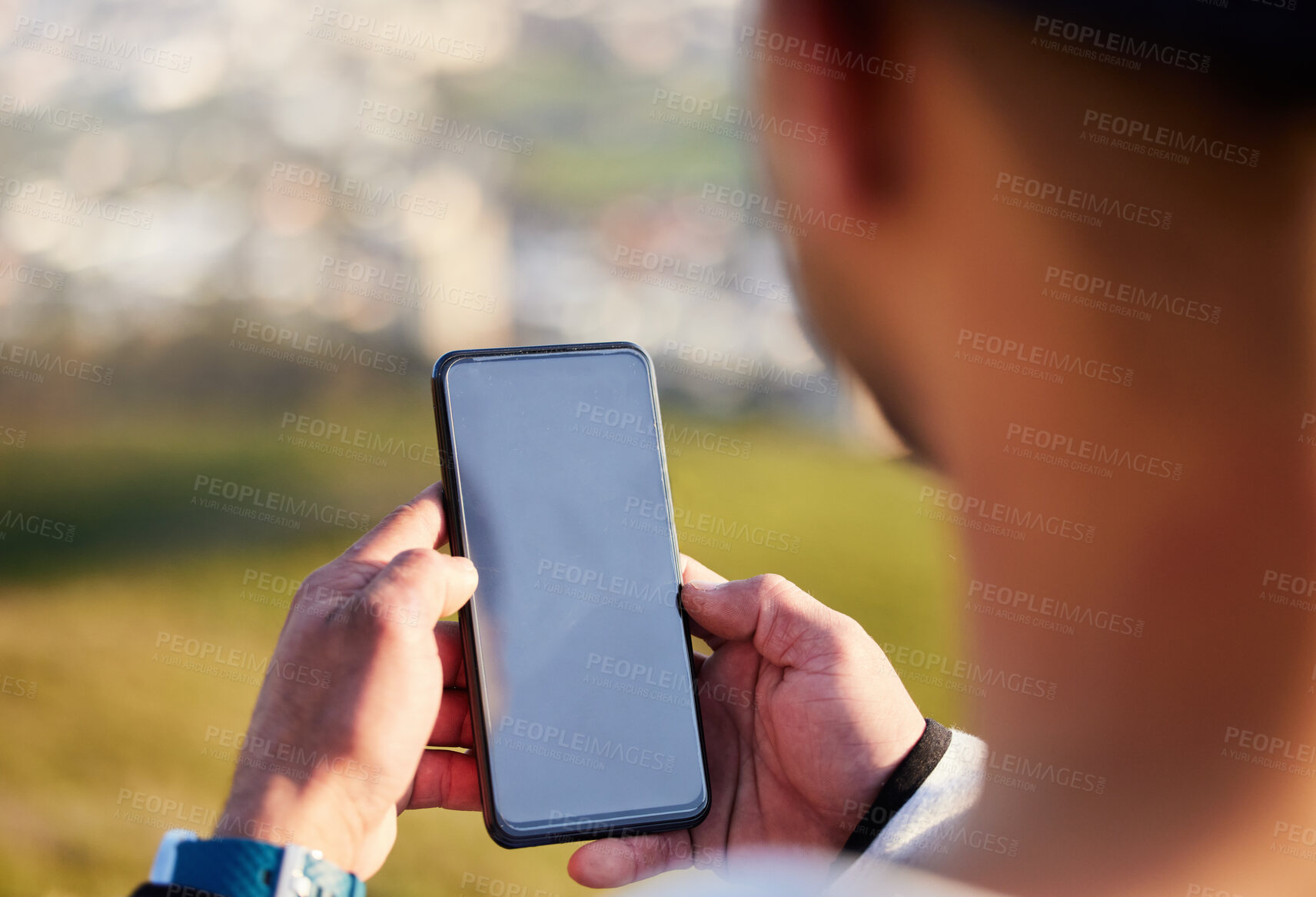 Buy stock photo Man, hands and phone with mockup screen in social media, chatting or texting for travel, journey or trip in nature. Hand of male holding smartphone display with 5G connection for GPS in the outdoors