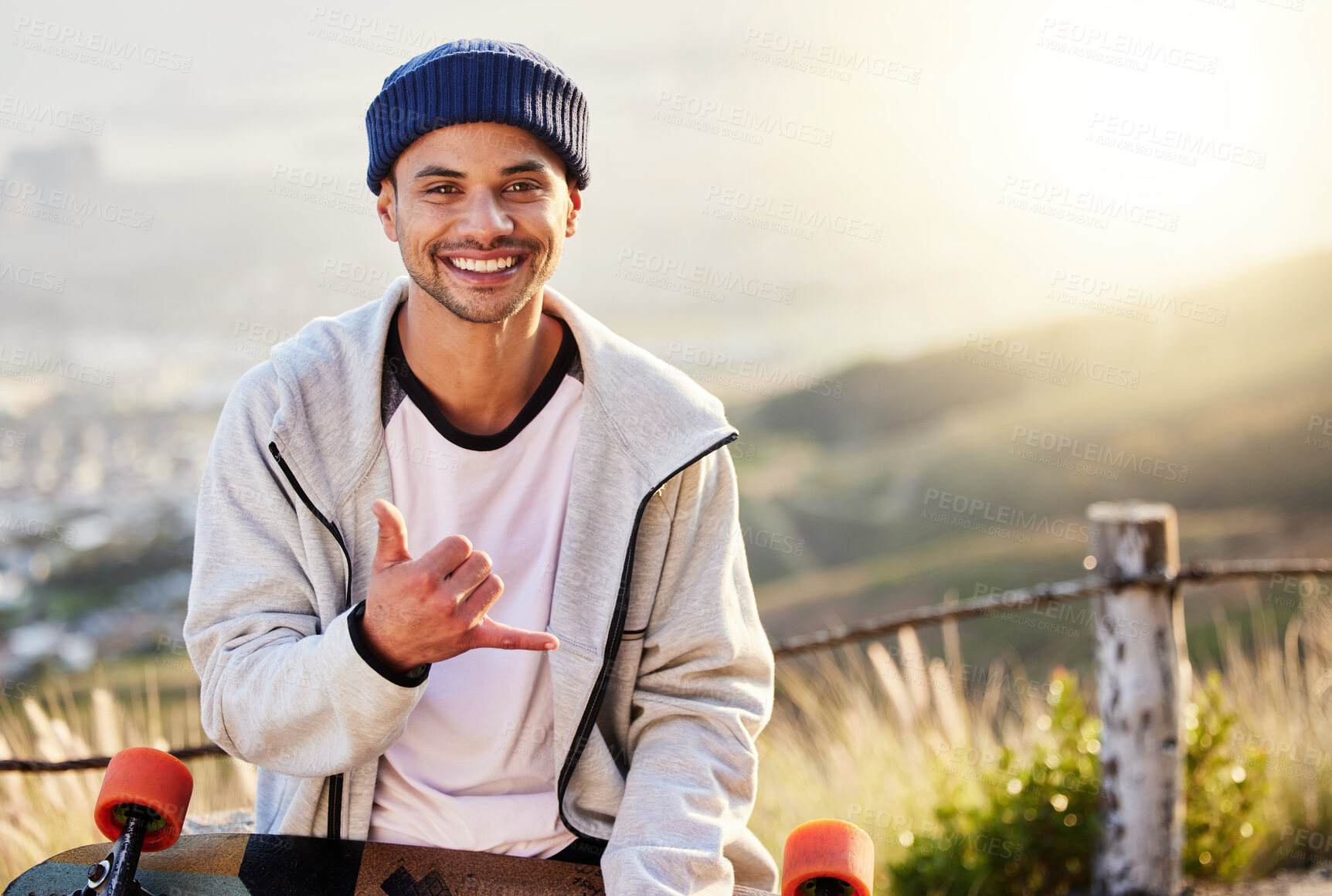 Buy stock photo Smile, portrait of skateboarder with shaka hand gesture and skateboarding hobby and skill on mountain. Freedom, fun and face of cool happy gen z man with happiness, longboard or skateboard and sports