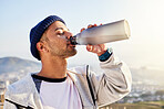 Man drinking water, runner in city with fitness and health, thirsty and hygiene with satisfaction and break from running outdoor. Bottle, h2o and eyes closed with young male, urban and exercise