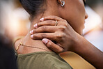 Closeup, Indian woman and neck pain with burnout, stress and agony with muscle strain, overworked and tension. Zoom, female and lady with health issue, problem or first aid with emergency or accident