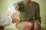 Therapist hands, tissue and black woman patient at therapy consultation for grief and depression. Mental support, healthcare consultation and sad female with trust and blurred background in a office