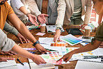 Color choice, creative and hands of business people on desk for branding meeting, strategy and marketing design. Teamwork, collaboration and designers brainstorming ideas, thinking and logo project