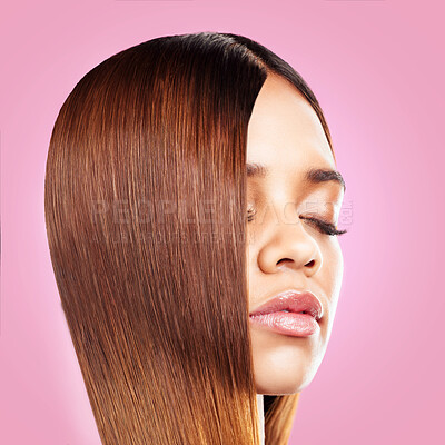 Buy stock photo Beauty, hair and face of black woman with eyes closed isolated in studio with pink background for salon advertising. Haircare, straightener and Brazilian hairstyle on model for growth product promo.